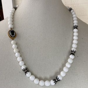 White faceted glass bead Cameo clasp necklace
